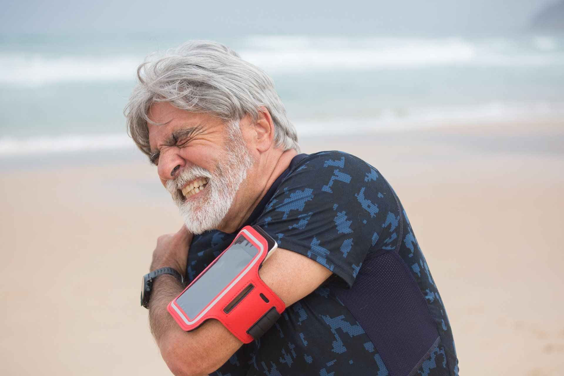 Person experiencing shoulder pain